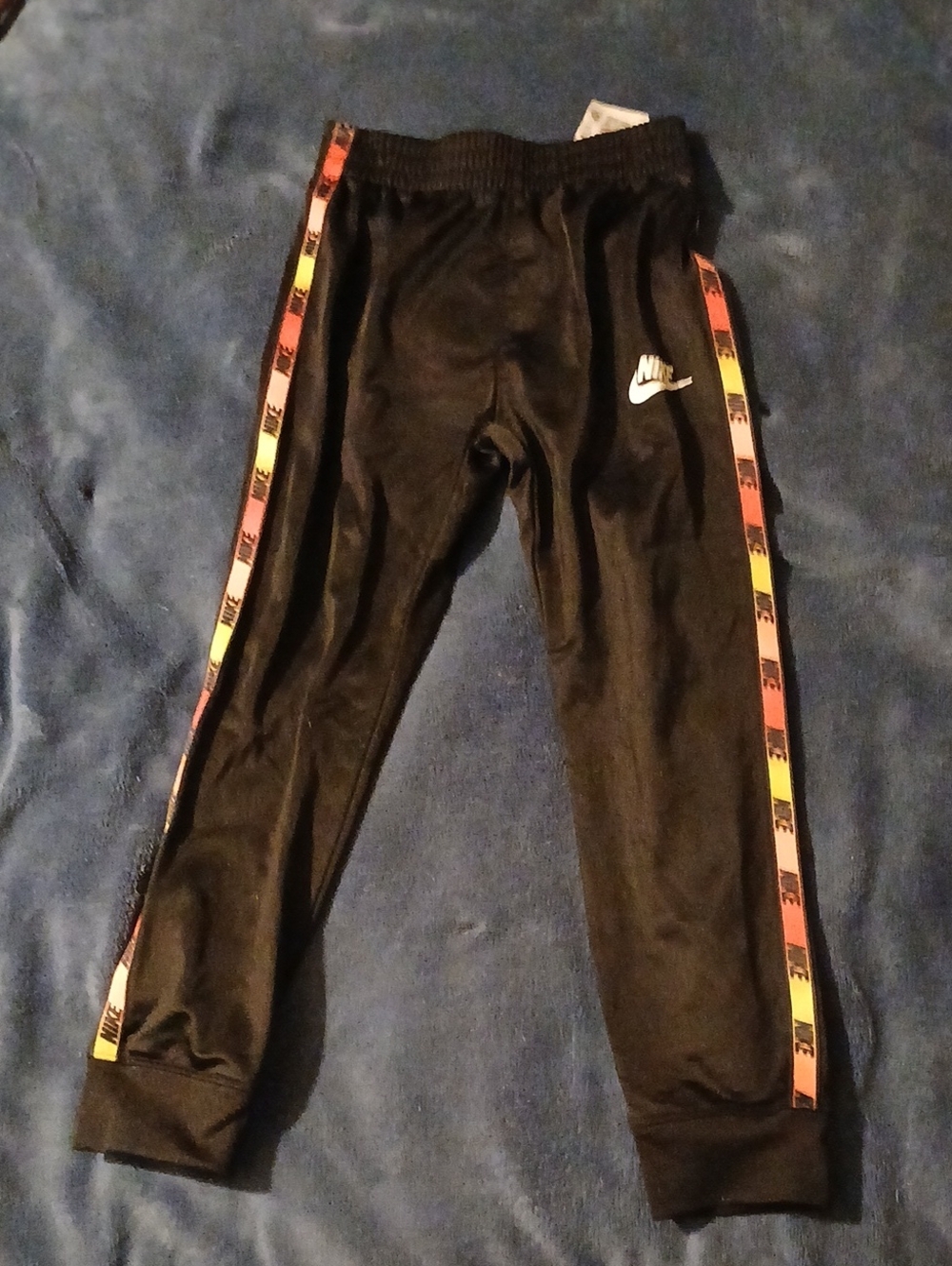 Nike Kids Black Joggers with Rainbow Stripe Tape